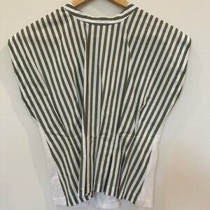 white sleeveless top with green and white striped trim